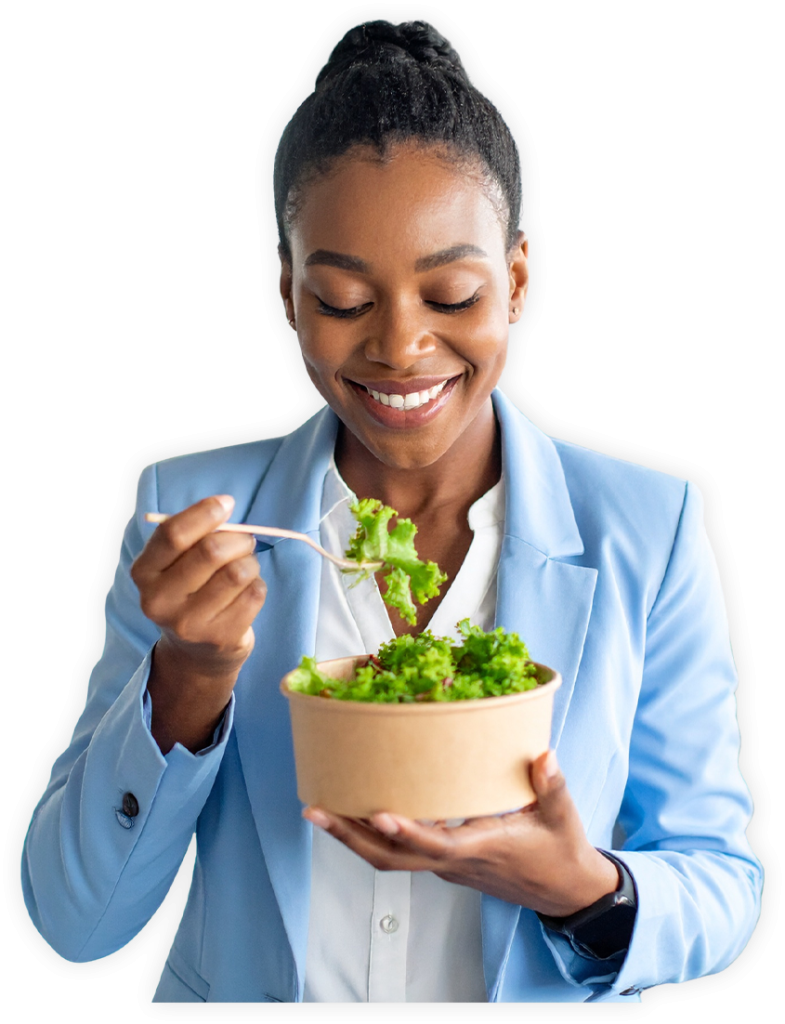 A lady wearing a blue blazer enjoying a salad from office micro market